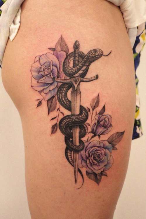 dagger and snake tattoo in legs