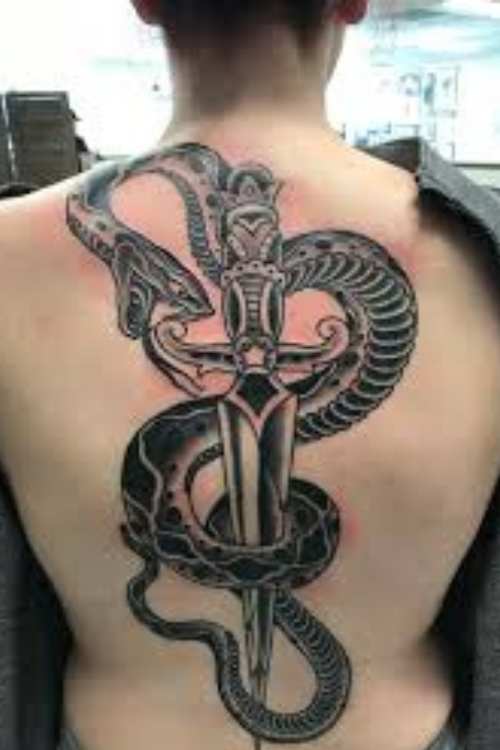 dagger and snake tattoo in back