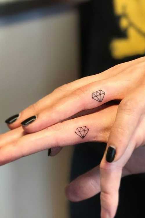 Romantic and Love-Themed Finger Tattoos